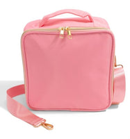 light pink backpack and lunch bag